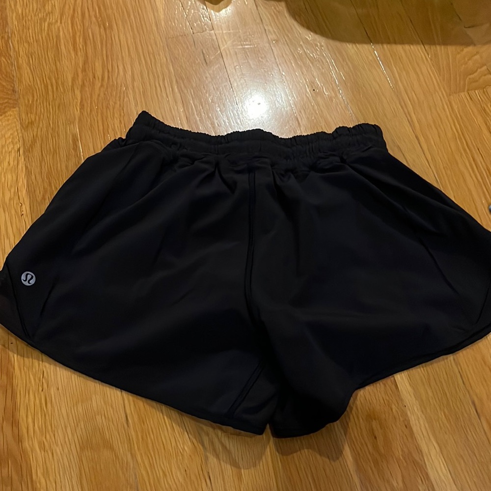 - Lululemon black low rise hotty hot shorts 4” tall